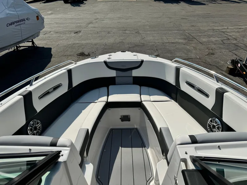 Slide: The Image of 2025 Chaparral 287 SSX boat interior with sleek seating and modern design. - 17
