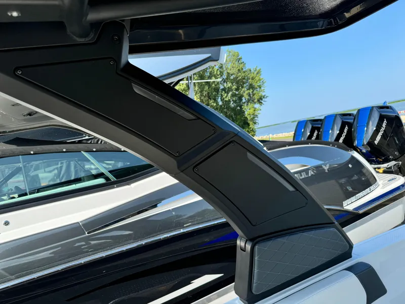 Slide: The Image of 2025 Chaparral 287 SSX boat with sleek design and modern features. - 23