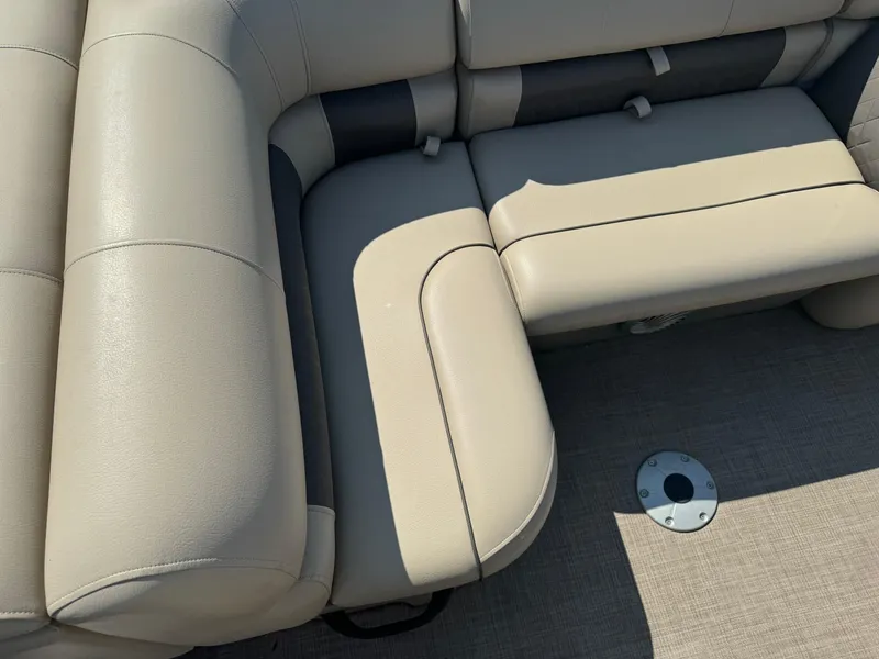 Slide: The Image of 2022 Sun Tracker SportFish 22 XP3 boat seating, beige upholstery, corner view. - 14