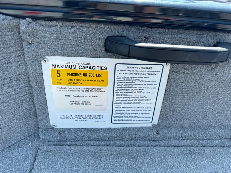 Slide: The Image of 2013 Tracker Pro Guide V-175 Combo capacity plate, showing maximum 5 persons or 760 lbs. - 10