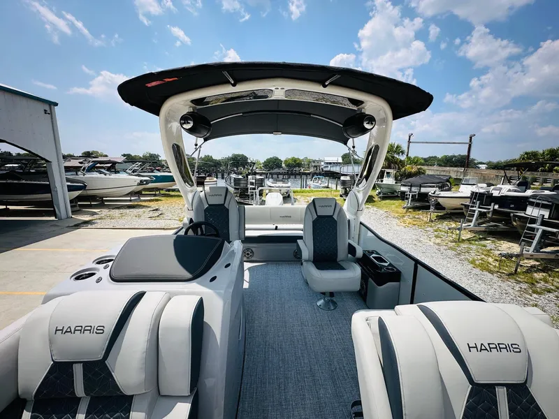 Slide: The Image of 2025 Harris Grand Mariner 250 boat interior with luxurious seating and modern design. - 15