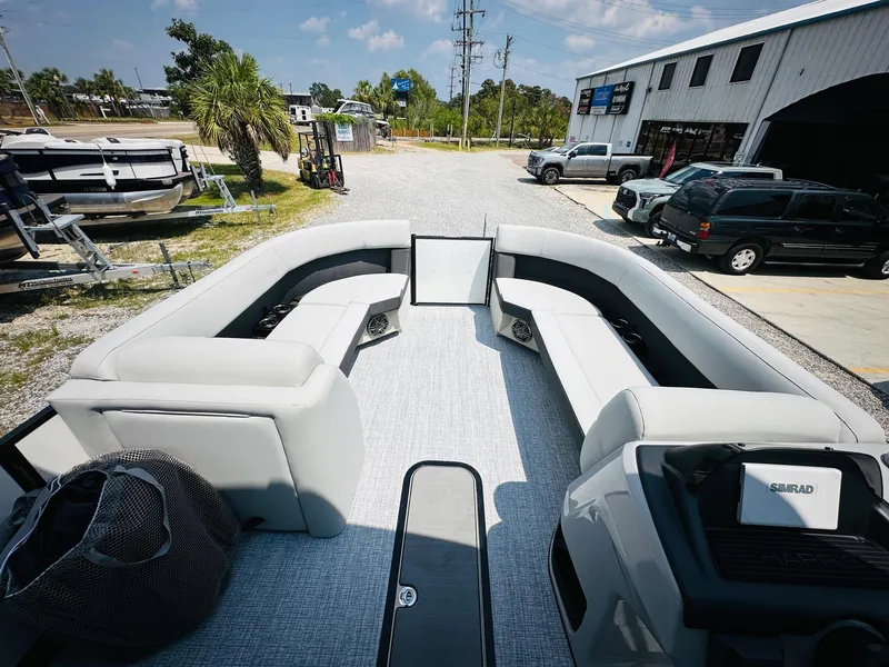 Slide: The Image of 2025 Harris Cruiser 230 pontoon boat interior with spacious seating and modern design. - 10