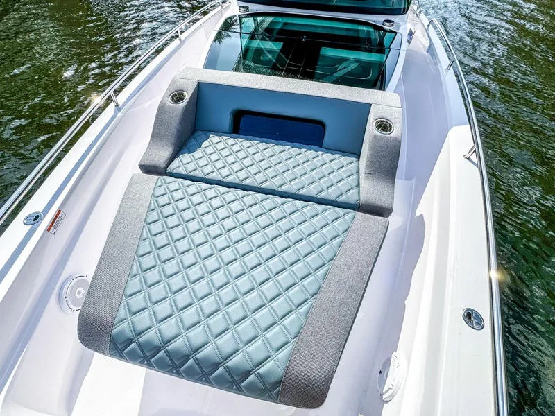 Slide: The Image of 2024 Axopar 37XC CROSS CABIN with luxurious quilted seating on deck. - 22