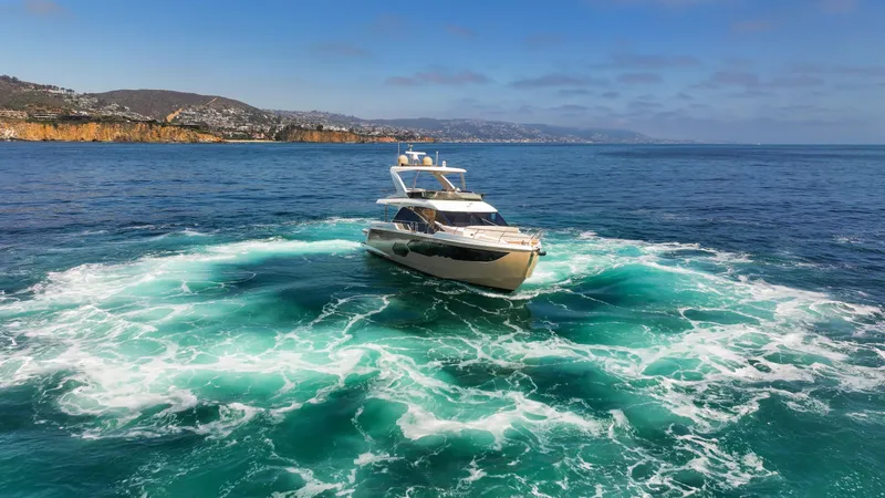 Slide: The Image of Luxury yacht Absolute 58 FLY 2019 cruising in clear blue ocean waters. - 10