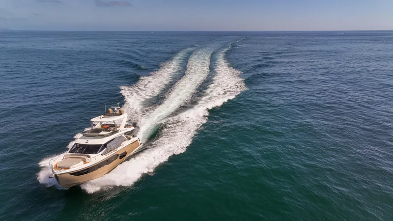 Slide: The Image of Luxurious 2019 Absolute 58 FLY yacht cruising on open sea. - 13