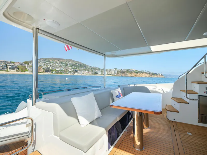 Slide: The Image of Luxurious 2019 Absolute 58 FLY yacht deck with scenic ocean view. - 32