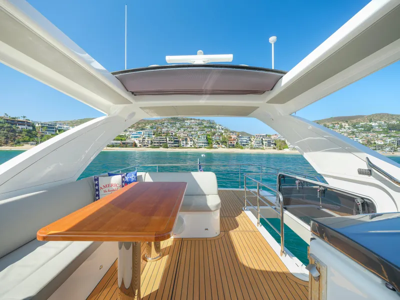 Slide: The Image of Luxurious 2019 Absolute 58 FLY yacht interior with ocean view and elegant seating area. - 34