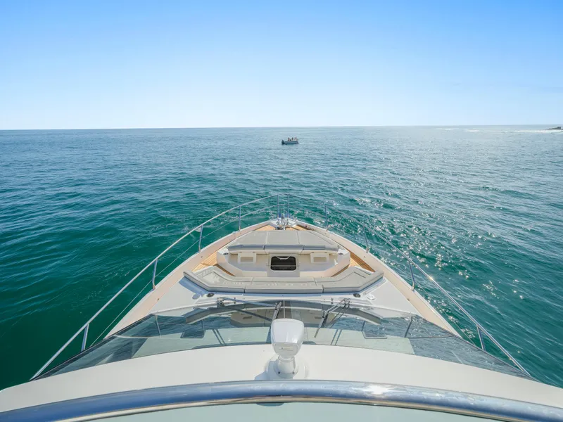 Slide: The Image of Absolute 58 FLY yacht cruising on open sea, 2019 model. - 37