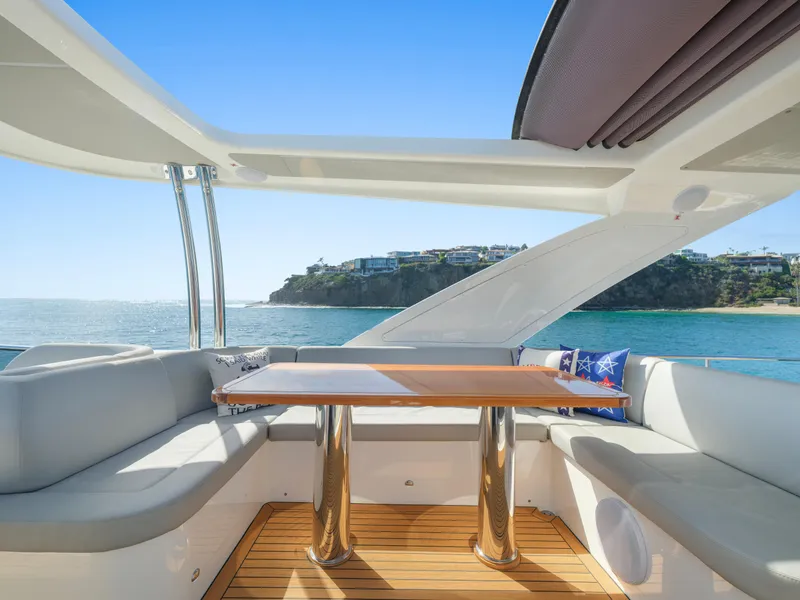 Slide: The Image of Luxurious 2019 Absolute 58 FLY yacht interior with ocean view and elegant seating area. - 43