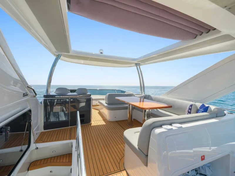 Slide: The Image of Luxurious 2019 Absolute 58 FLY yacht with spacious deck and seating area. - 46
