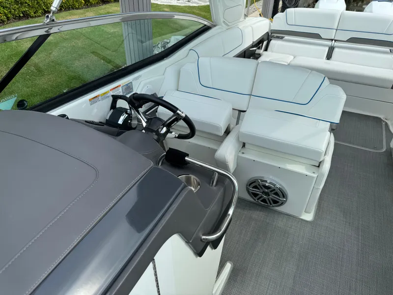 Slide: The Image of 2019 Formula 310 Bowrider OB interior with sleek seating and modern dashboard. - 31