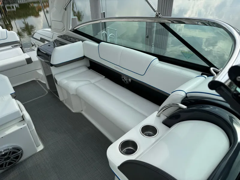 Slide: The Image of 2019 Formula 310 Bowrider OB interior with white seating and modern design. - 32