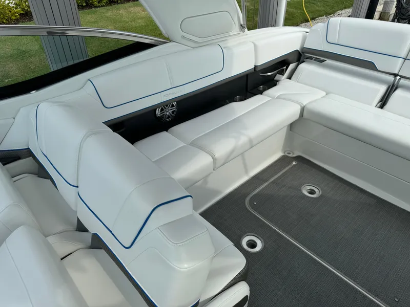 Slide: The Image of 2019 Formula 310 Bowrider OB interior with white seating and modern design. - 33
