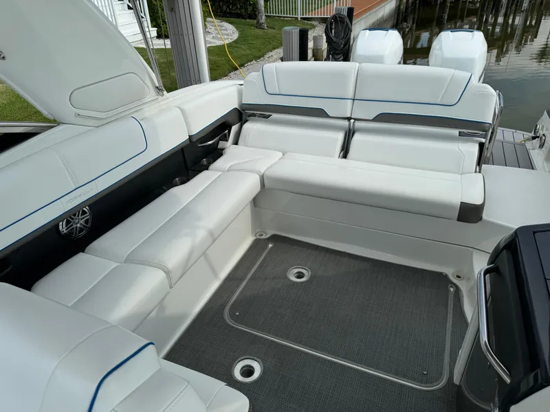Slide: The Image of 2019 Formula 310 Bowrider OB interior with white seating and spacious layout. - 34