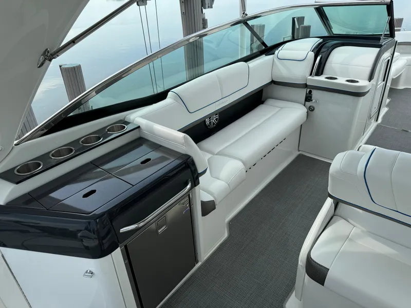 Slide: The Image of 2019 Formula 310 Bowrider OB interior with sleek seating and modern amenities. - 36