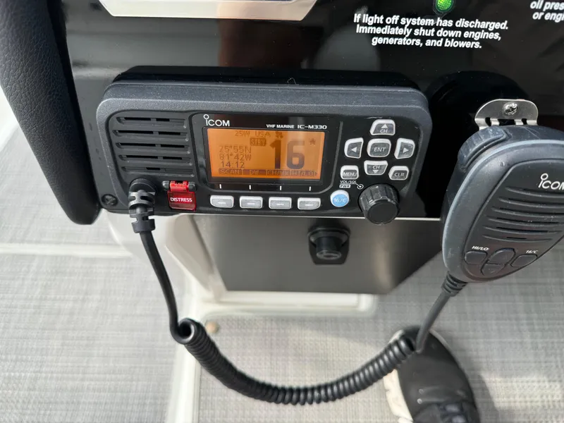 Slide: The Image of VHF marine radio on 2019 Formula 310 Bowrider OB boat dashboard. - 48