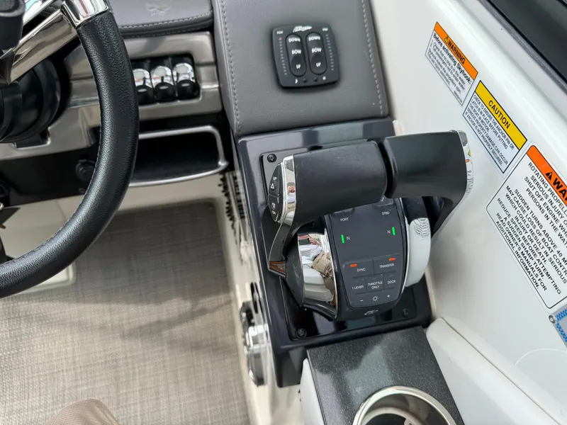 Slide: The Image of 2019 Formula 310 Bowrider OB helm with controls and steering wheel. - 49