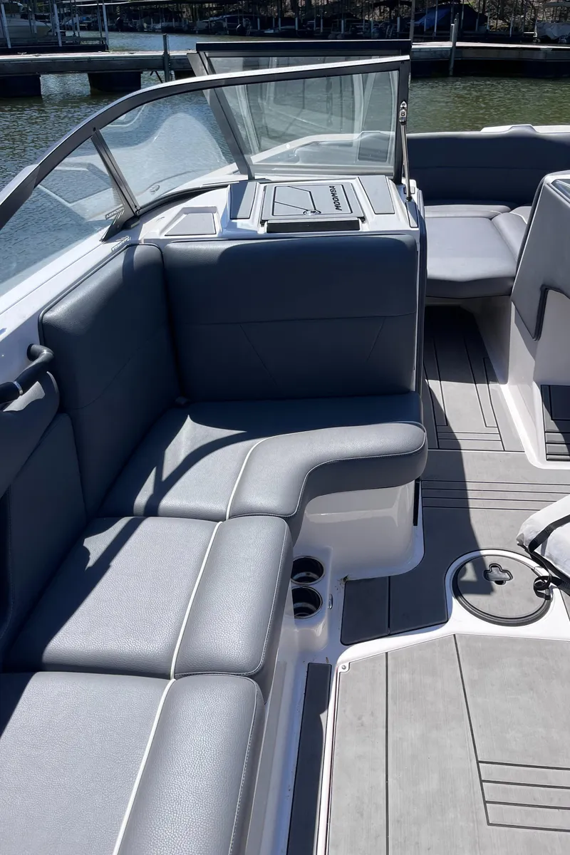 Slide: The Image of 2024 Moomba Max boat interior with gray seating and sleek design. - 28