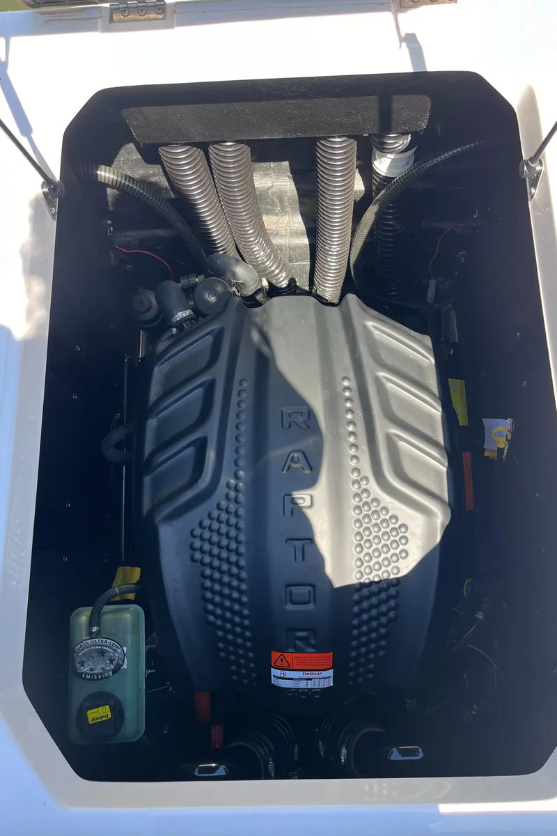 Slide: The Image of 2024 Moomba Max engine compartment featuring a Raptor engine. - 39