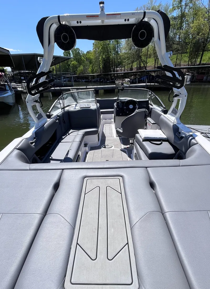 Slide: The Image of 2024 Moomba Max boat interior with sleek seating and advanced audio system. - 9