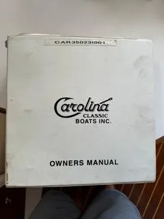 Slide: The Image of Carolina Classic 35 2001 owner's manual cover, white with black text. - 28