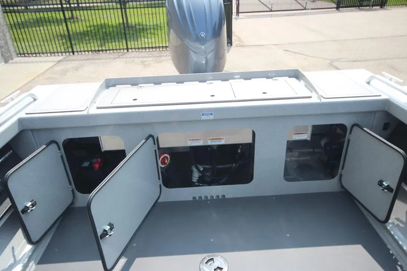 Slide: The Image of 2025 Weldcraft 200 Rebel F150 boat interior with open storage compartments. - 10