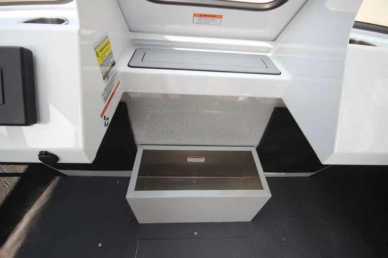 Slide: The Image of 2025 Weldcraft 200 Rebel F150 interior storage compartment detail. - 23