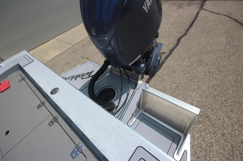 Slide: The Image of 2025 Weldcraft 200 Rebel F150 boat engine and deck detail. - 6