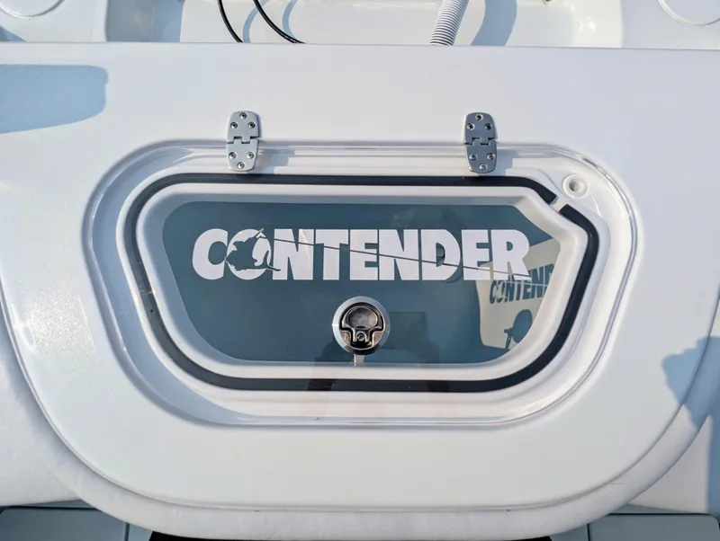Slide: The Image of 2025 Contender 24 Sport boat hatch with logo, featuring sleek design and durable construction. - 6