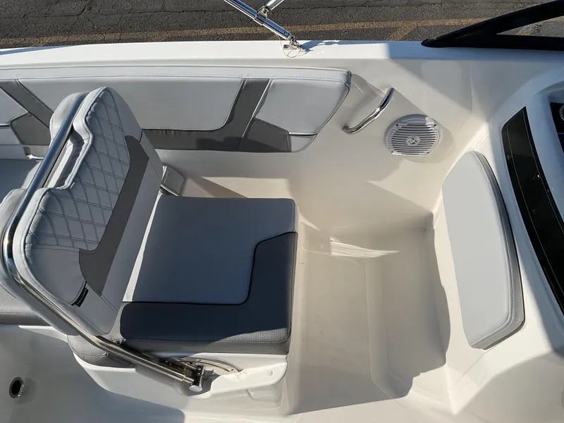 Slide: The Image of 2025 Bayliner VR6 Bowrider OB interior with gray seating and modern design. - 11