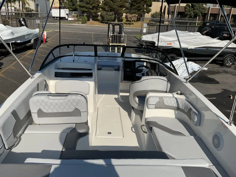 Slide: The Image of 2025 Bayliner VR6 Bowrider OB interior with spacious seating and modern design. - 13