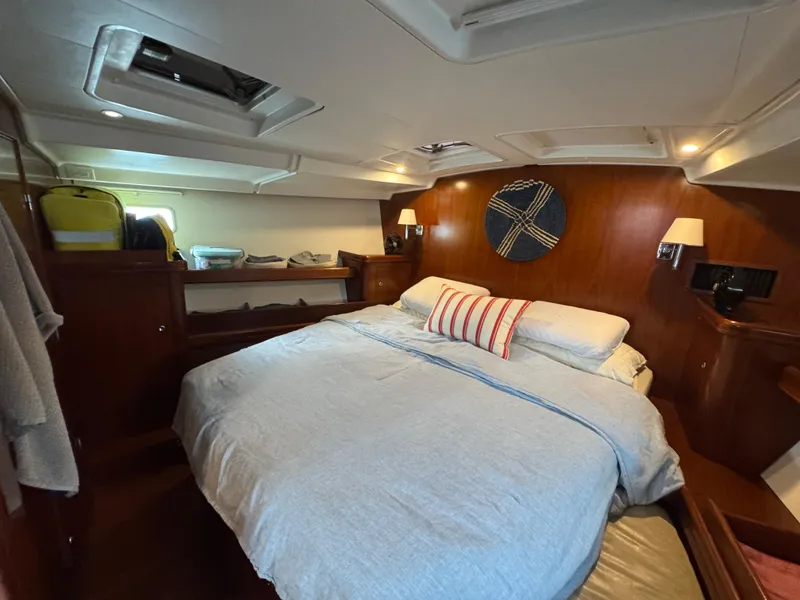 Slide: The Image of Luxurious cabin interior of 2005 Beneteau 523 Oceanis yacht with cozy bedding. - 19