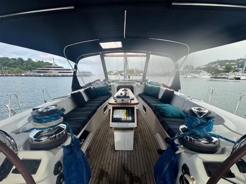 Slide: The Image of Cockpit of 2005 Beneteau 523 Oceanis sailboat with seating and navigation equipment. - 23