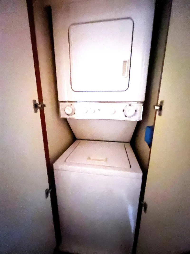 Slide: The Image of Stacked washer and dryer in 2004 Grand Harbour Motor Yacht. - 19