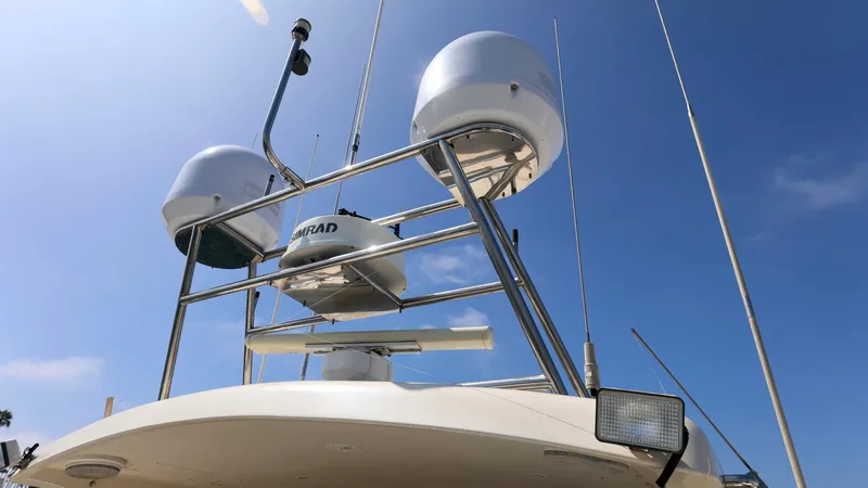 Slide: The Image of Radar equipment on a 2004 Grand Harbour Motor Yacht against a clear blue sky. - 34