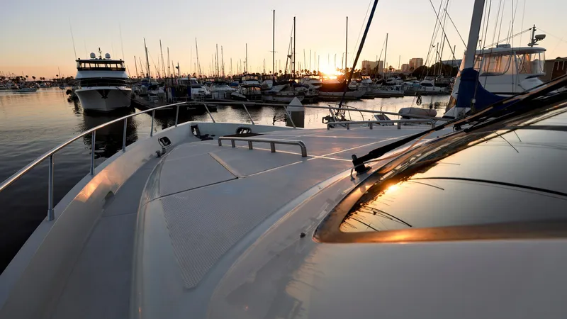 Slide: The Image of Sunset view from 2004 Grand Harbour Motor Yacht in a marina. - 46