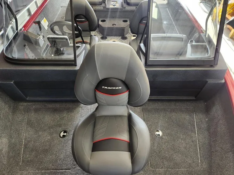 Slide: The Image of 2025 Tracker Pro Guide™ V-175 Combo boat interior with seating and carpeted flooring. - 13