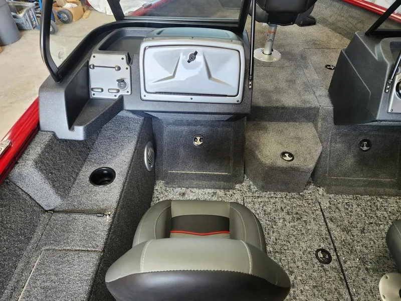 Slide: The Image of 2025 Tracker Pro Guide™ V-175 Combo boat interior with seating and storage compartments. - 7