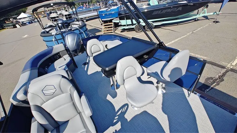 Slide: The Image of 2025 South Bay S224E 3.0 pontoon boat with modern seating and sleek design. - 4