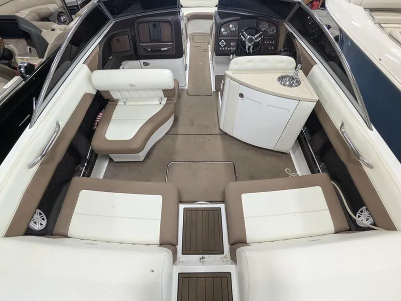 Slide: The Image of Interior of 2014 Cobalt 296 boat with seating and helm. - 6