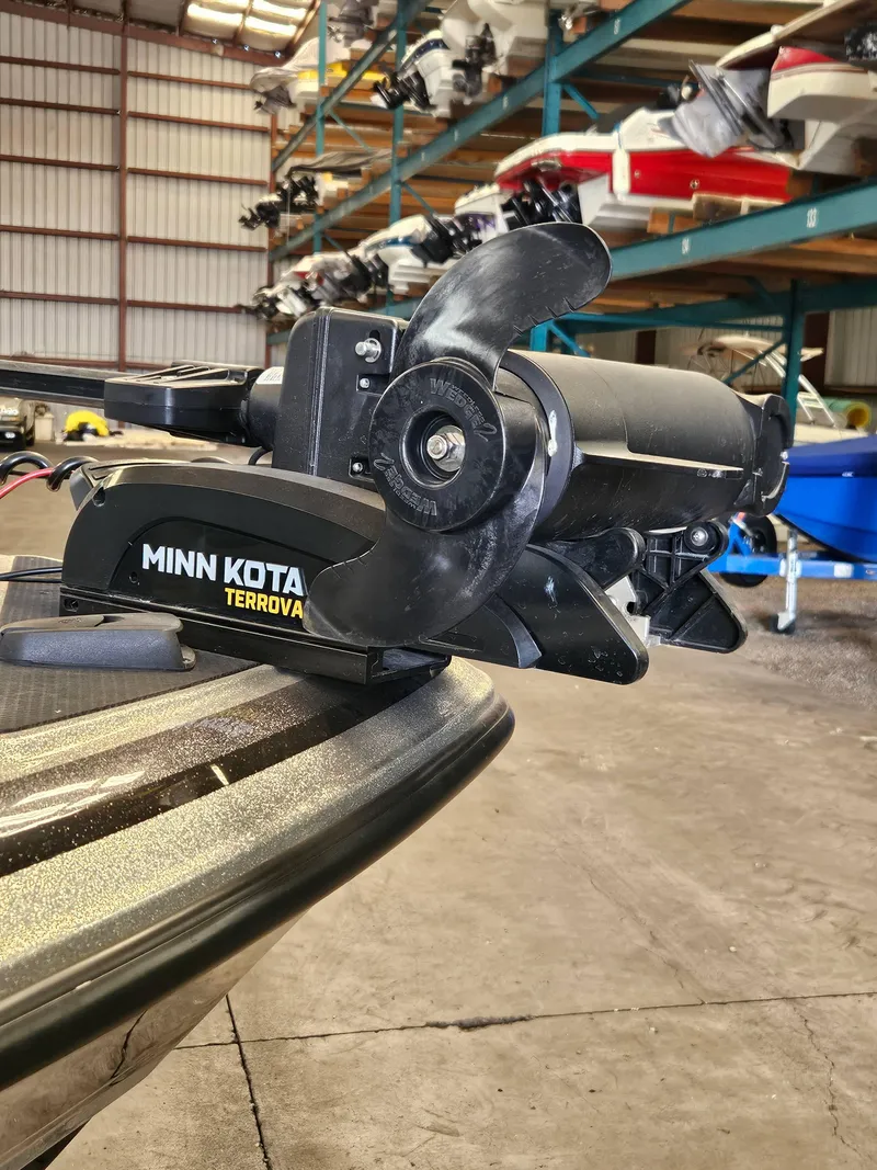 Slide: The Image of Minn Kota Terrova motor on 2022 Lund TYEE boat in storage facility. - 10