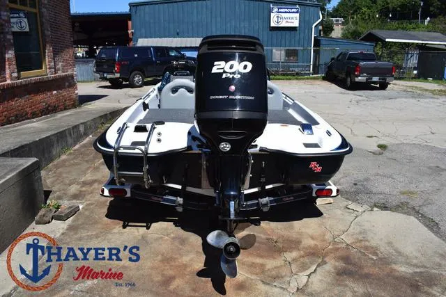 Slide: The Image of 2012 Bass Cat Pantera IV boat with 200 Pro engine at Thayer's Marine. - 11