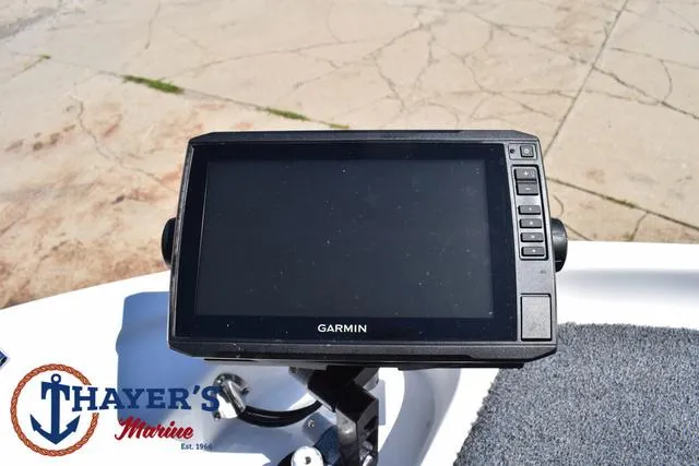 Slide: The Image of Garmin fishfinder on 2012 Bass Cat Pantera IV boat, Thayer's Marine logo visible. - 15
