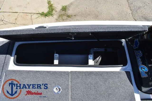 Slide: The Image of 2012 Bass Cat Pantera IV boat storage compartment, Thayer's Marine logo visible. - 18