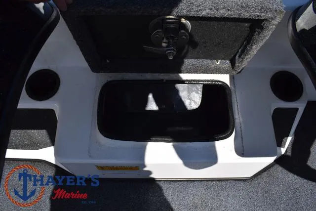 Slide: The Image of 2012 Bass Cat Pantera IV boat storage compartment, Thayer's Marine logo visible. - 24