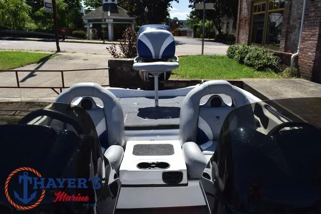 Slide: The Image of 2012 Bass Cat Pantera IV boat interior with seating and console, Thayer's Marine logo visible. - 27