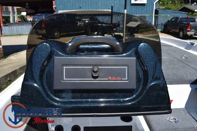 Slide: The Image of 2012 Bass Cat Pantera IV boat dashboard with storage compartment, located at Thayer's Marine. - 29
