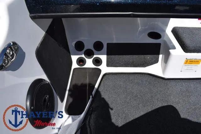 Slide: The Image of 2012 Bass Cat Pantera IV boat interior with cup holders and speaker. - 31