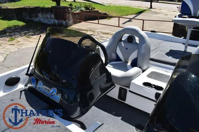 Slide: The Image of 2012 Bass Cat Pantera IV boat interior with steering console and seating. - 33