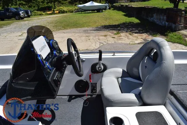 Slide: The Image of 2012 Bass Cat Pantera IV boat interior with steering console and seat. - 34